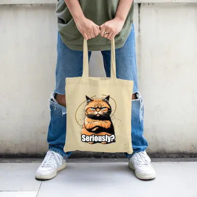 ote bag featuring a sarcastic cartoon cat with the text “Seriously?” in bold lettering.
