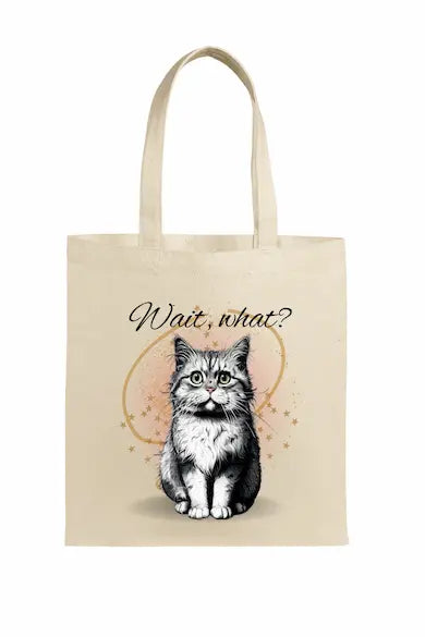 Funny canvas tote bag with shocked cartoon cat and large text “WAIT, WHAT?!” in expressive comic-style lettering.