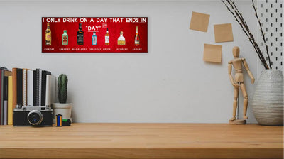T-shirt with bold text saying “I ONLY DRINK ON A DAY THAT ENDS IN DAY” in clean, comic-style font. Great gift for beer lovers, wine fans, and daily sippers