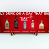 T-shirt with bold text saying “I ONLY DRINK ON A DAY THAT ENDS IN DAY” in clean, comic-style font. Great gift for beer lovers, wine fans, and daily sippers