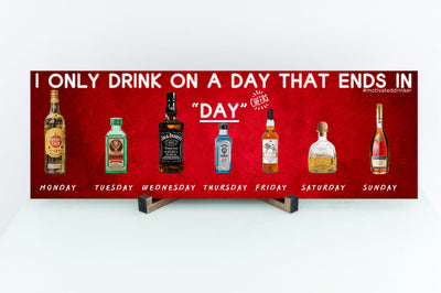 T-shirt with bold text saying “I ONLY DRINK ON A DAY THAT ENDS IN DAY” in clean, comic-style font. Great gift for beer lovers, wine fans, and daily sippers