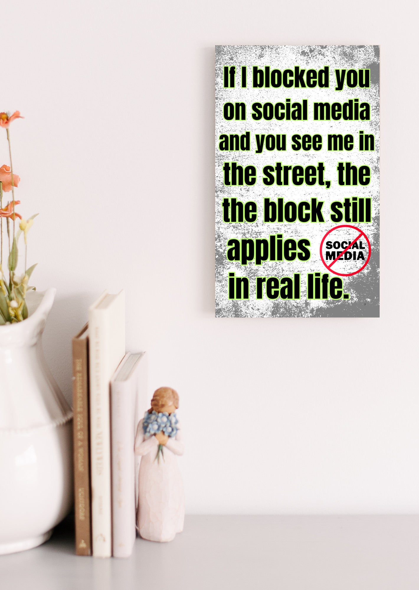 Wooden plaque with bold comic-style text: “If I blocked you on social media, you probably deserved it” displayed in sarcastic font.