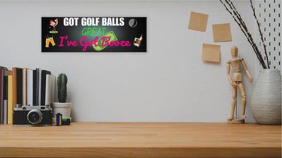 Funny golf cart plaque that reads "Got Golf Balls? Great. I’ve Got Booze." with neon text and bar cart imagery.