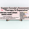 Wooden plaque with the quote “Therapy is expensive, so I make jokes instead,” styled in bold retro font for comedic mental health decor.
