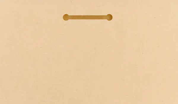 “Funny wall plaque reading 'Slapstick Wake Up Calls Should Come with Warnings' displayed on a kitchen wall near a coffee mug”