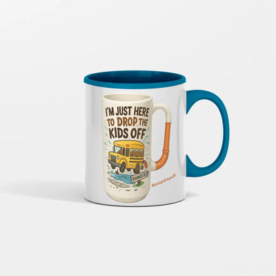 Mug with a red interior and handle, featuring a graphic of a school bus and text on a white background. “Sarcastic gag gift toilet mug for coffee lovers”