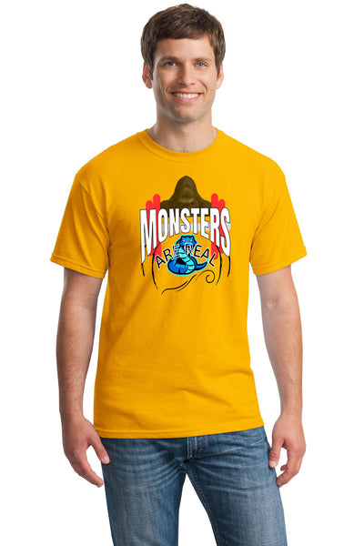 Man wearing "Monsters Are Real" gym shirt lifting weights in gritty gym