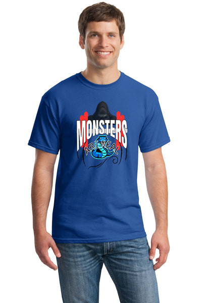 Man wearing "Monsters Are Real" gym shirt lifting weights in gritty gym