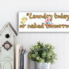 Rustic-style plaque with bold text: “Laundry Today or Naked Tomorrow” – humorous wall décor for laundry rooms, moms, or sarcastic households.