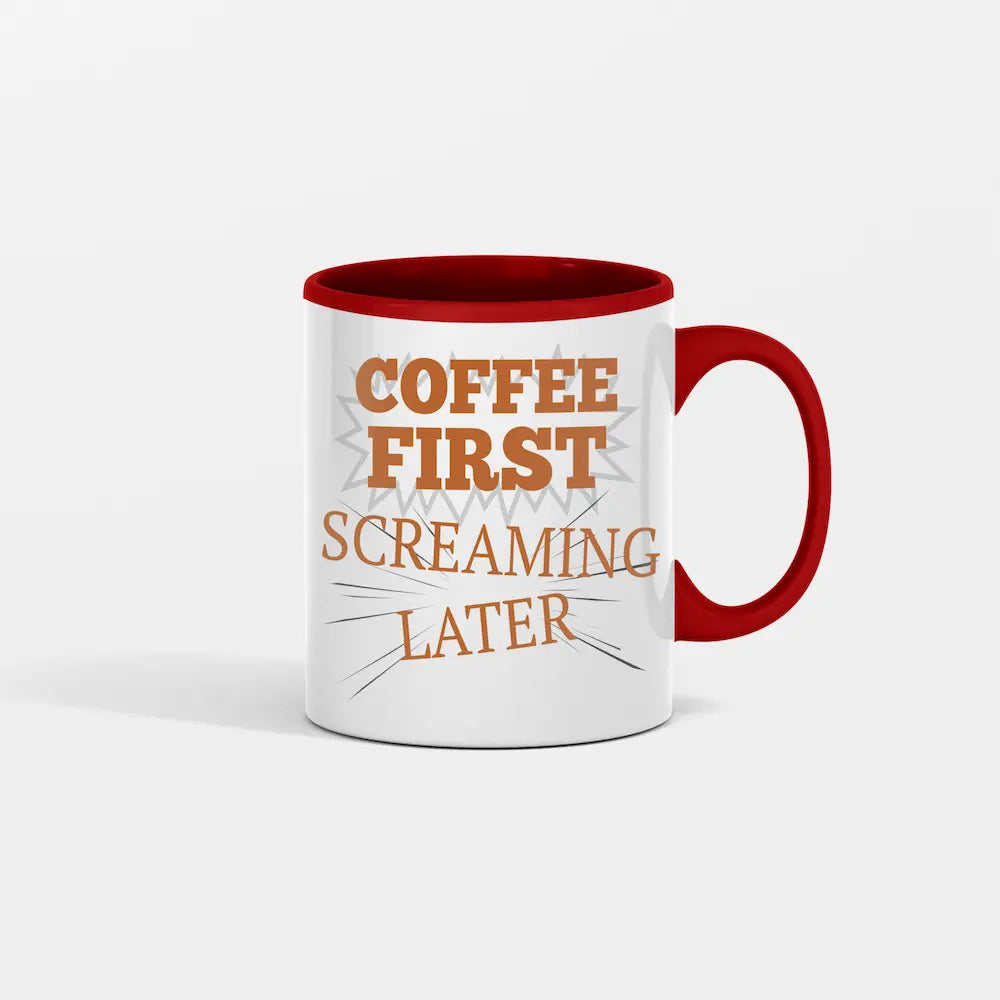 A white ceramic coffee mug with bold black text reading “COFFEE FIRST SCREAMING LATER” placed next to spilled beans and a frazzled notepad.