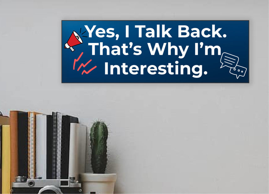 Funny humorous wall plaque with the phrase “YES, I TALK BACK – THAT’S WHY I’M INTERESTING” in bold lettering.