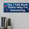 Funny humorous wall plaque with the phrase “YES, I TALK BACK – THAT’S WHY I’M INTERESTING” in bold lettering.