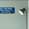 Funny humorous wall plaque with the phrase “YES, I TALK BACK – THAT’S WHY I’M INTERESTING” in bold lettering.