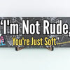 Funny sarcastic wall plaque reading “I’m Not Rude, You’re Just Soft” – bold typography home and office decor by Teka Originals.