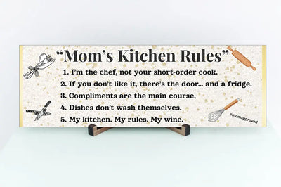 Rustic “Mom’s Kitchen Rules” funny wall plaque with bold black lettering and playful rules, perfect humorous kitchen décor gift for moms.