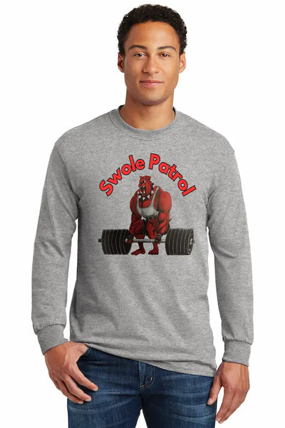 Athlete wearing SWOLE PATROL long sleeve gym motivation t shirt mid workout.