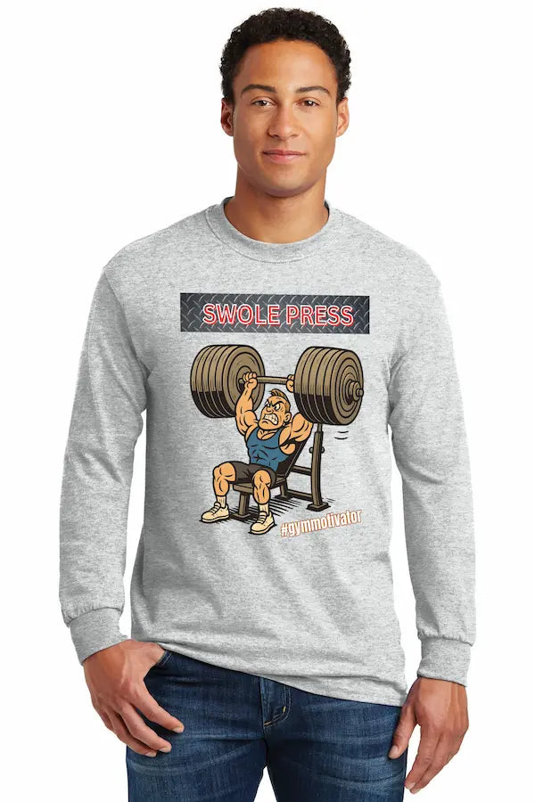 Athlete wearing SWOLE PRESS long sleeve gym t-shirt pressing barbell.