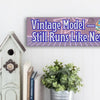 Wooden plaque with bold engraved text “Vintage Model – Still Runs Like New,” designed for grandmothers as a funny and heartfelt décor piece.