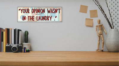 Sarcastic wall plaque with the phrase “Your Opinion Wasn’t in the Laundry” – bold home office décor gift