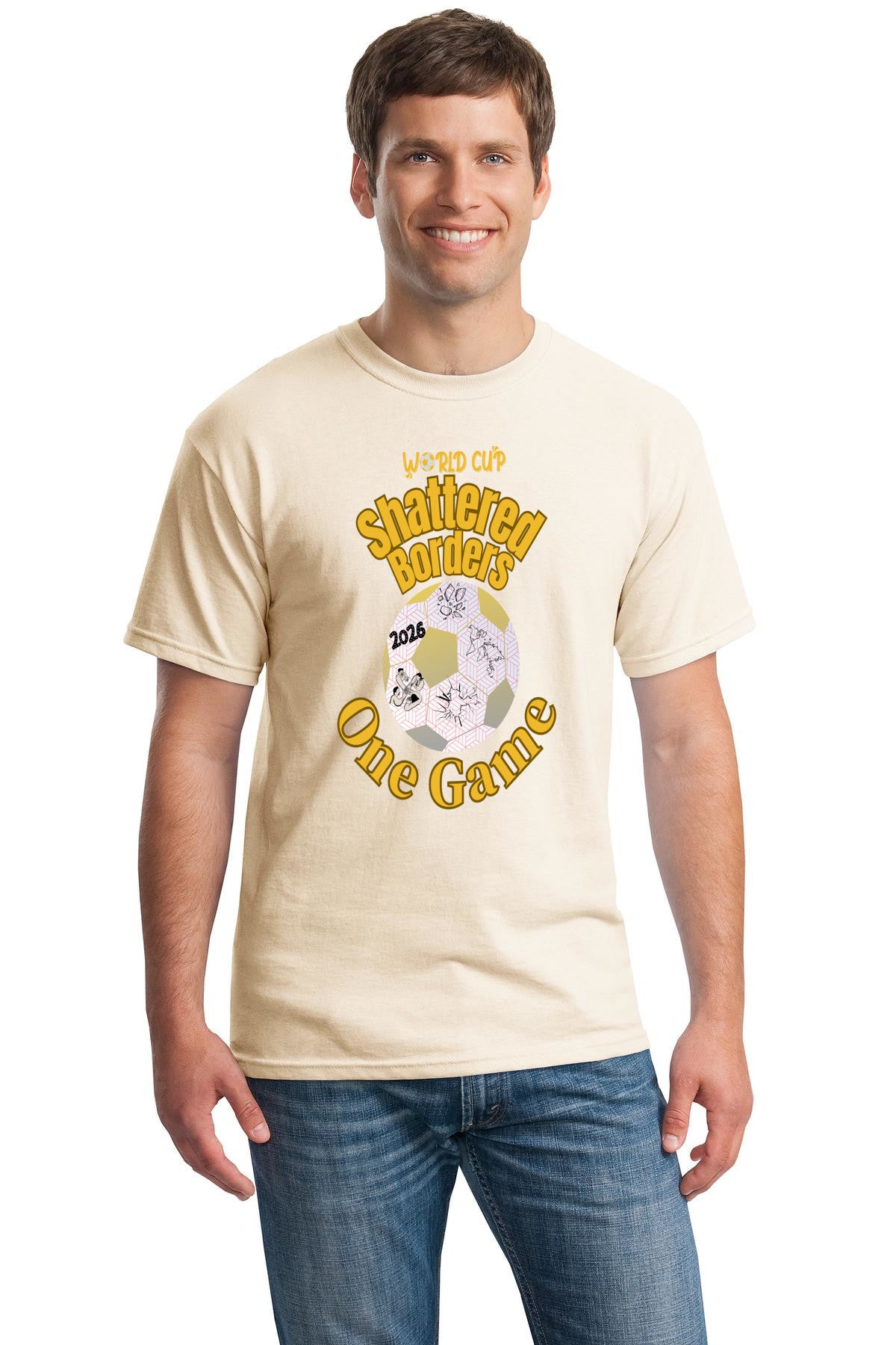 “Shattered Borders – One Game World Cup 2026 T-Shirt featuring fractured world map panels with glowing seams symbolizing soccer unity.”