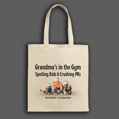 Anime-style illustration of a tough grandmother carrying the “Grandma’s in the Gym Tote Bag” into a gym filled with weights.