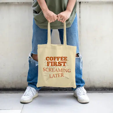 "Funny sarcastic tote bag with Coffee First Screaming Later design – perfect caffeine gift for coffee lovers."