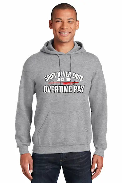 First responder hoodie with bold slogan “Shift Never Ends, Just the Overtime Pay” in rugged typography, styled for firefighters, EMTs, and police.