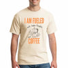 Beige cotton T-shirt with bold print reading “I Am Fueled With Happy Thoughts,” designed as a sarcastic lifestyle statement shirt.