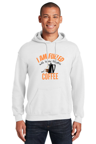 White hoodie with bold text reading “I Am Fueled With Happy Thoughts And Coffee”