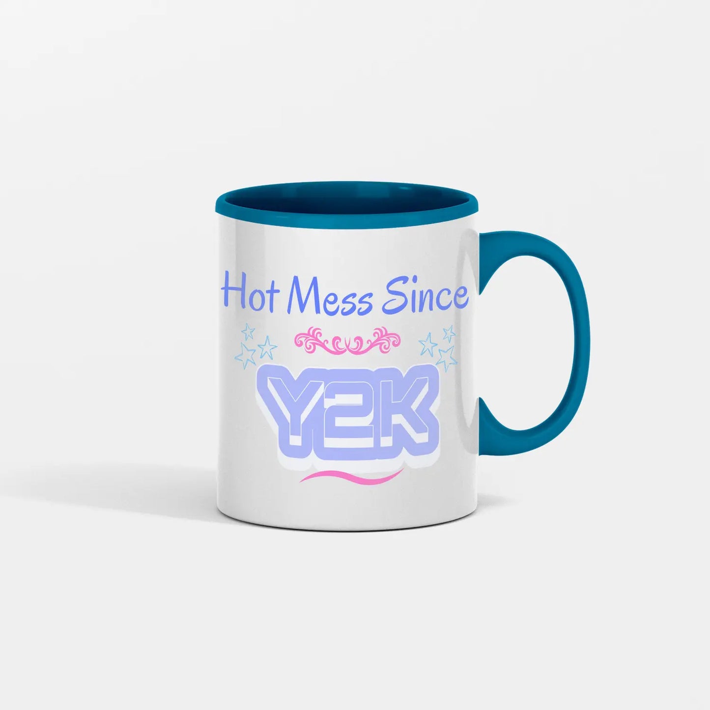 “Hot Mess Since Y2K 2.0 ceramic coffee mug featuring bold retro text, nostalgic pink-and-black 2000s aesthetic, and humorous design celebrating modern chaos.”