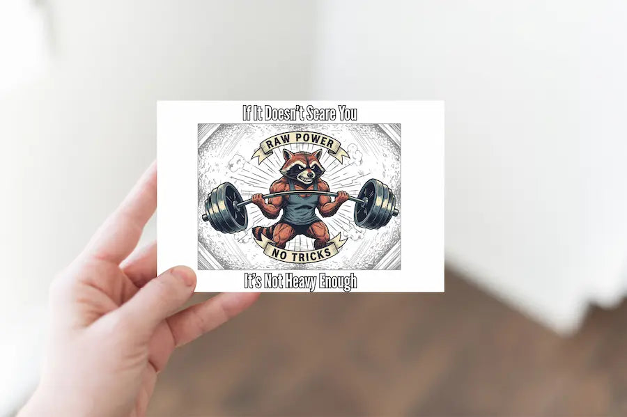 Hand-drawn postcard reading “If It Doesn’t Scare You, It’s Not Heavy Enough,” featuring bold ink typography and distressed gym-chalk background.