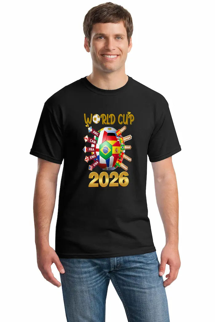 Bold black World Cup 2026 T-shirt featuring vibrant multicolor flags and “UNITED IN CHAOS” typography, modeled in a festive street scene of fans celebrating.