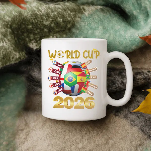 “World Cup 2026 Coffee Mug — ceramic soccer fan mug with bold retro design and caffeine-fueled game day energy.”