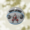 Ornament with Santa Claus lifting weights and 'Happy Liftmas' text on a blurred background
