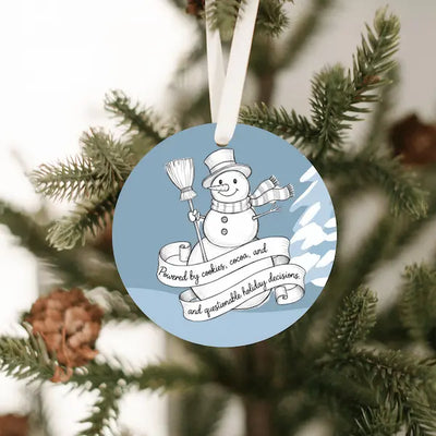 Handdrawn snowman Christmas ornament with cookie-themed details, illustrated sketch style, no background.