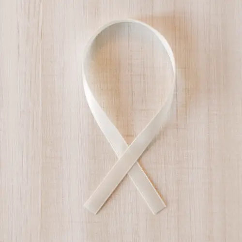 Handdrawn snowman Christmas ornament with cookie-themed details, illustrated sketch style, no background.