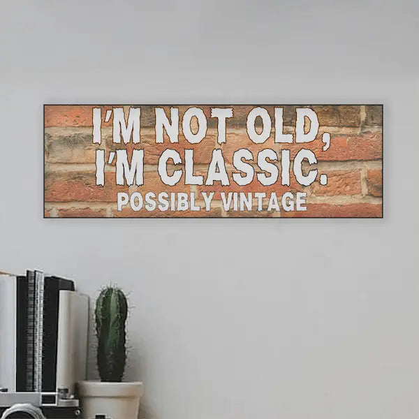 “Funny sarcastic plaque reading ‘I’m Not Old, I’m Classic Possibly Vintage’ printed on MDF retro-style wall sign”