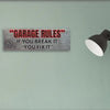 Garage Rules MDF plaque with bold text: “If You Break It, You Fix It,” styled in industrial, humorous typography.