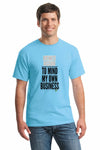 Natural unisex t-shirt with bold text reading “Business Decision To Mind My Own Business” displayed flat on a neutral background.