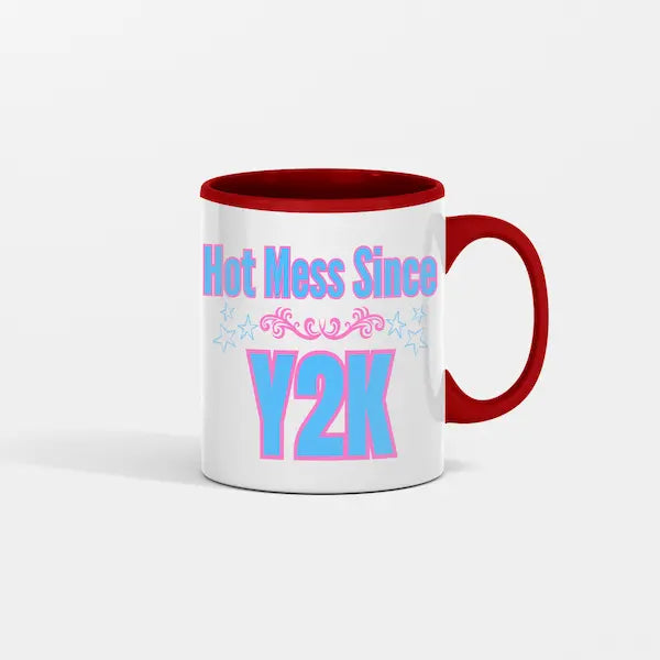 “Hot Mess Since Y2K 2.0 ceramic coffee mug featuring bold retro text, 
nostalgic pink-and-black 2000s aesthetic, and humorous design celebrating 
modern chaos.”
