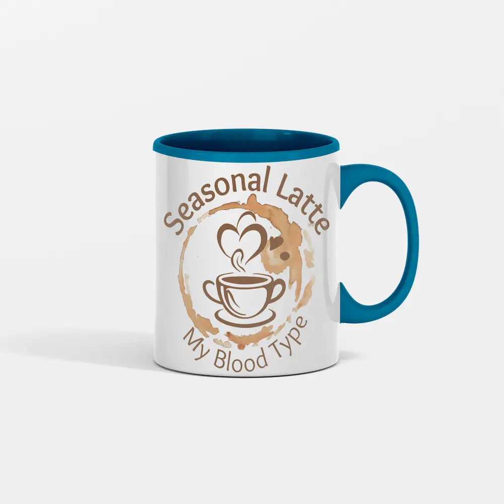 Hand-drawn seasonal latte coffee mug with leaf foam art.