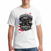 Cotton T-shirt with bold “American Pride – Forged by Work” text, modeled on a rugged workspace background.