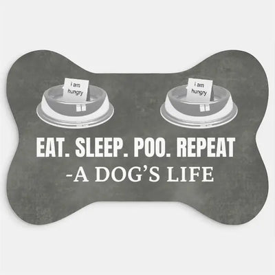 Eat. Sleep. Poo. Repeat dog humor bone-shaped pet mat under feeding bowls